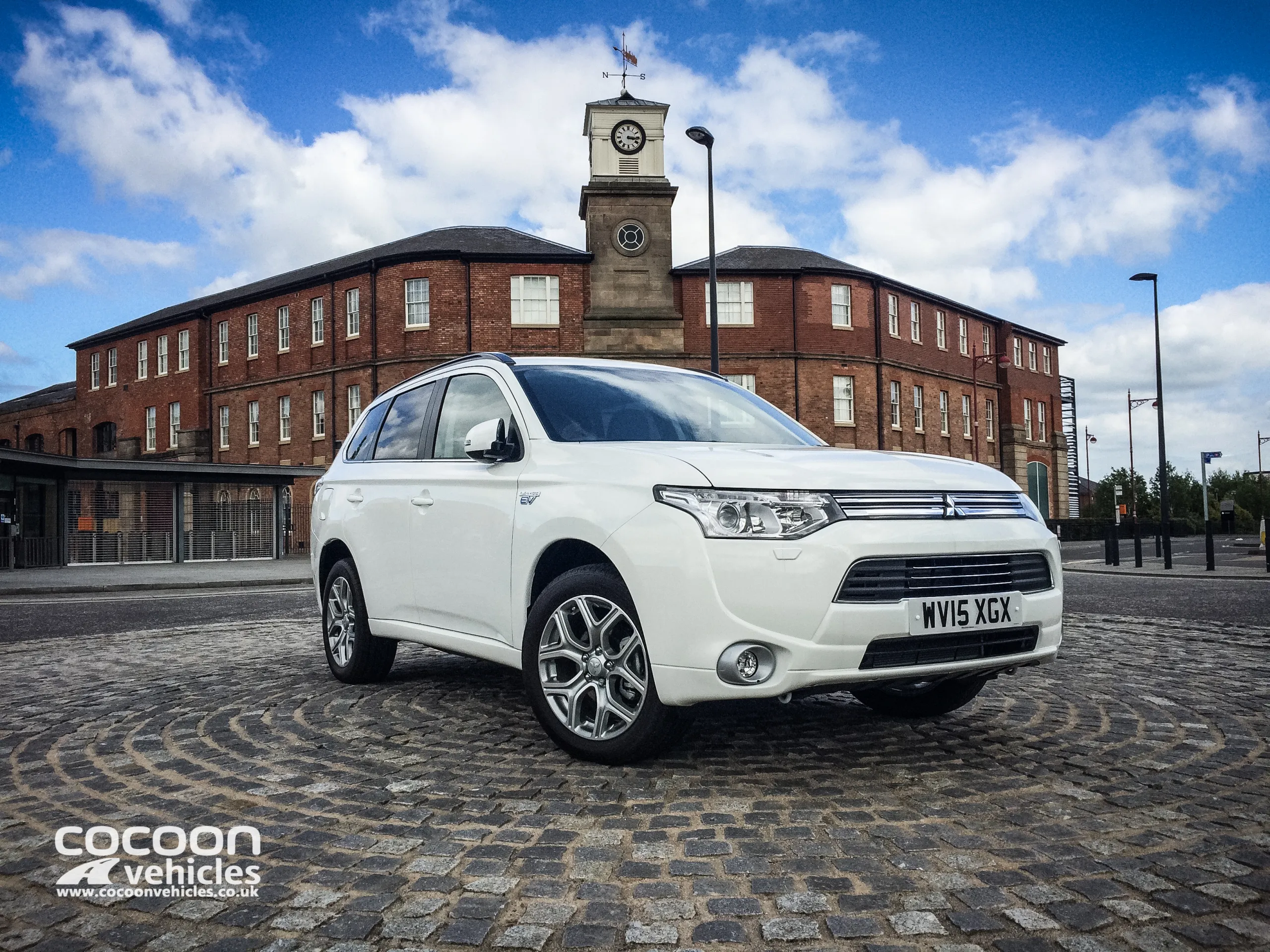 Mitsubishi Outlander in White outside Derby Roundhouse
